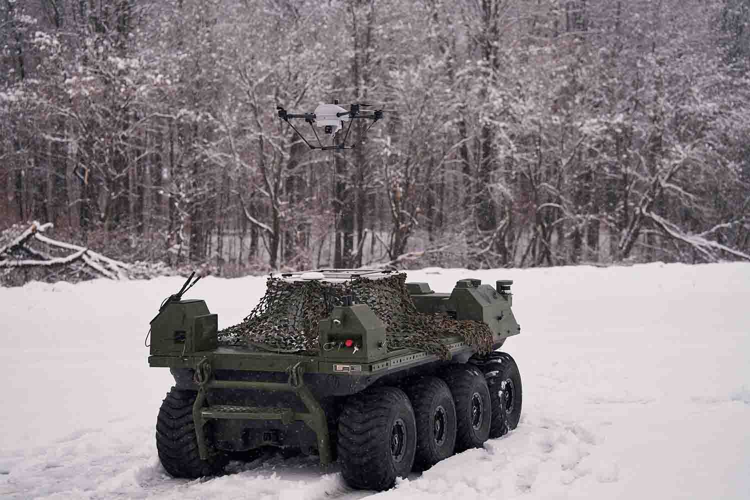 Khronos Drone flying from Rheinmetall's UGV on on a snowy road