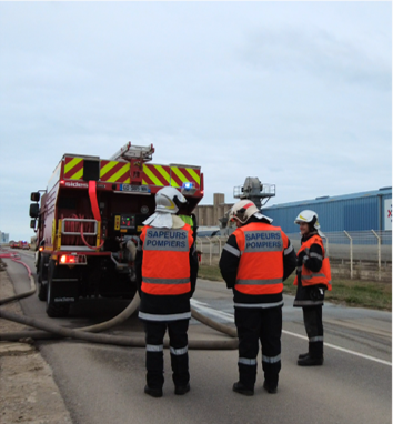 Firefighters work together on a gas leaking incident