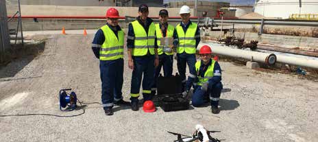 firefighters using drone for assistance during fire incident